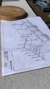 McMenemin Engineering Plans on table